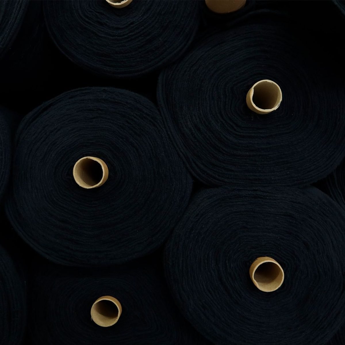 Textile Output Up 13%, Apparel Down 7.4%: What It Means for Custom Apparel Buyers